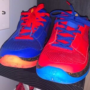 Ja Morant 1 red and blue Nike athletic shoes